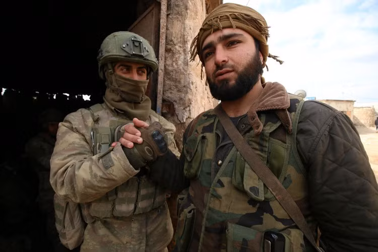 Cho đến khi bị quân đội chính phủ Syria (SAA) đánh bại vào năm 2018, nhóm này đã liên minh với Hay'at Tahrir al-Sham (HTS) - một tổ chức khủng bố có liên kết với al-Qaeda.
