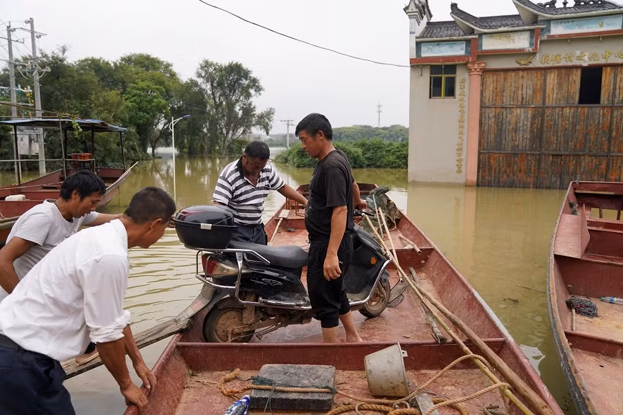 Trung Quoc: Dan lang tinh Giang Tay do xo di so tan vi lu-Hinh-9