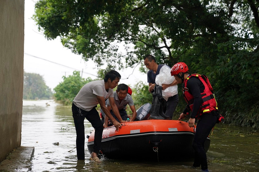 Trung Quoc: Dan lang tinh Giang Tay do xo di so tan vi lu-Hinh-2