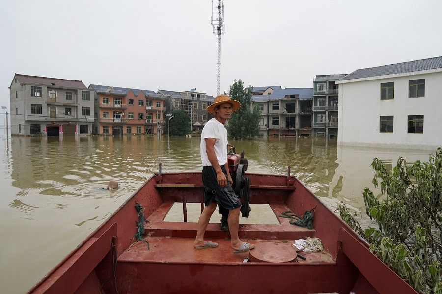 Trung Quoc: Dan lang tinh Giang Tay do xo di so tan vi lu-Hinh-6