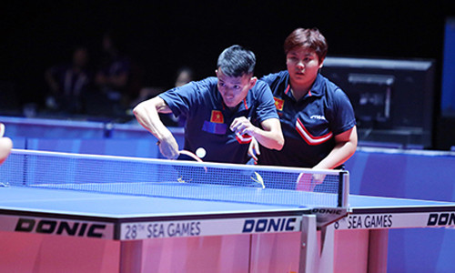 Quang Linh và Mỹ Trang chắc chắn giành huy chương thứ hai cho Đoàn TTVN. Ảnh: Đức Cường.