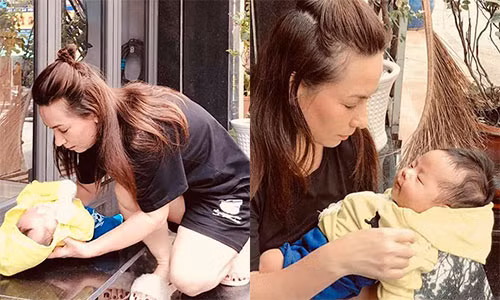 Phi Nhung nhan them con nuoi, em be bi bo roi truoc cua nha