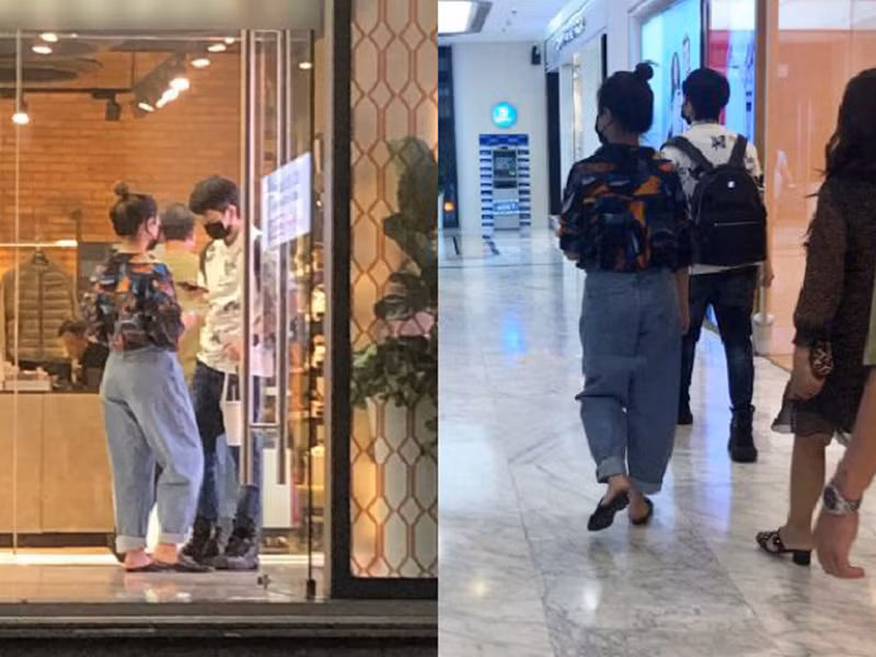Gil Lê và Hoàng Thùy Linh khá kín kẽ khi cùng đi dạo tại trung tâm thương mại. Ảnh: