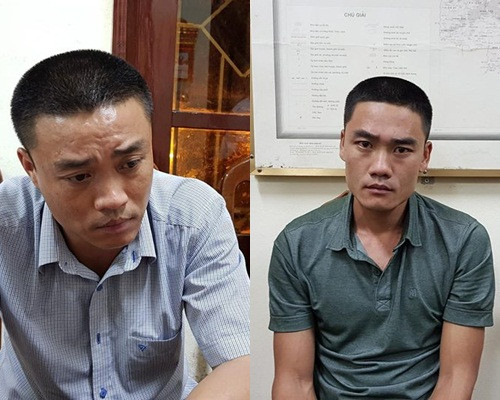 Lân (trái) và Dũng tại cơ quan công an.