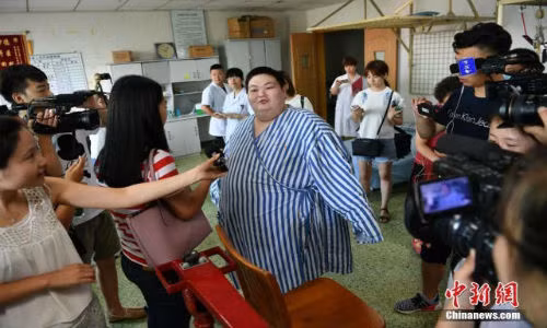 Nguoi dan ong beo nhat Trung Quoc giam 70 kg trong 5 thang