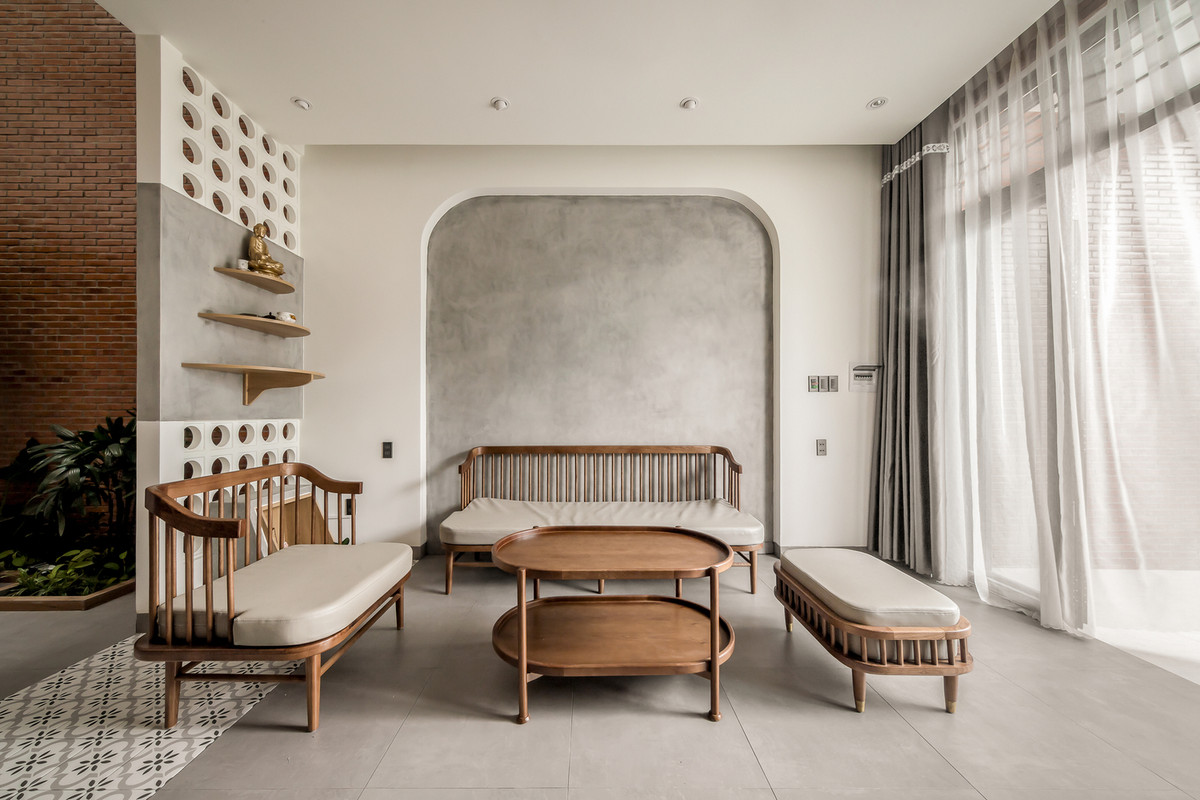 Tại tầng trệt, các thành viên trong gia đình có thể quây quần bên nhau, cùng dùng bữa tối, xem phim, nhâm nhi ly trà chiều. Ảnh: Minq Bui