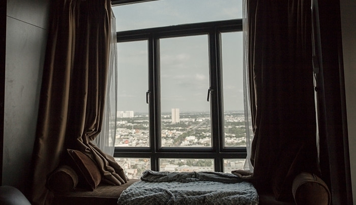 Từ phòng ngủ có thể ngắm nhìn quang cảnh của quận 7, quận 8 (TP HCM). Ảnh: Vietnamnet