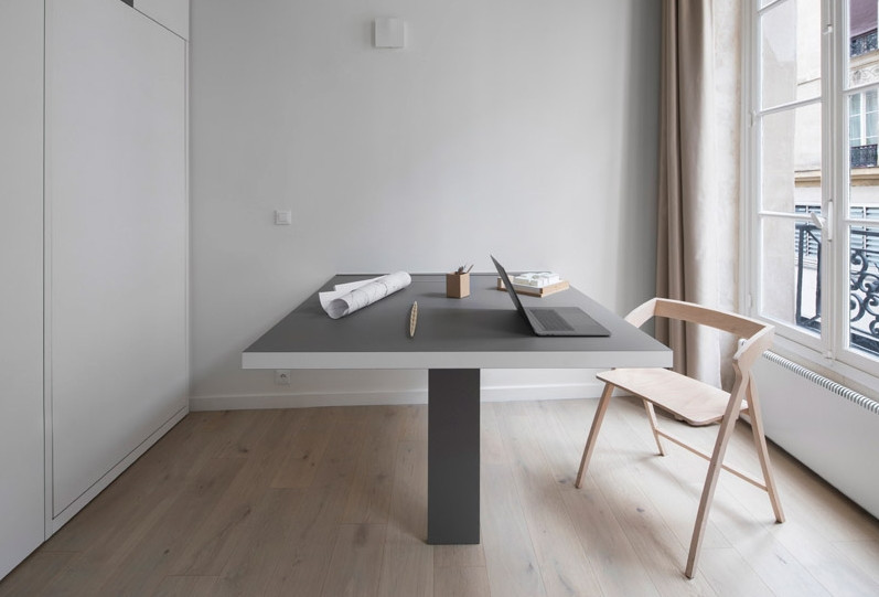 Chiếc hộp màu trắng giữa nhà chứa tất cả các chức năng cần thiết. Ảnh: Designboom