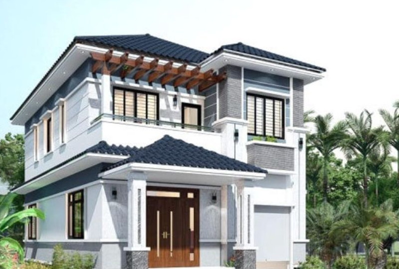 Nhà 2 tầng mái Nhật hiện đại sử dụng sơn trắng kết hợp cột ốp đá vàng nhạt tạo cảm giác nguy nga, bề thế. Ảnh: Thietke365