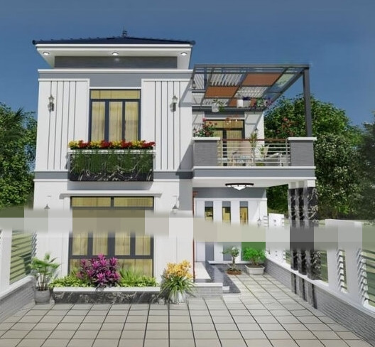 Mẫu nhà chữ L 2 tầng có sân vườn, ban công nhỏ với mái che bằng lam gỗ mang đến không gian sống xanh mát, gần gũi với thiên nhiên. Ảnh: Trungnguyendesign