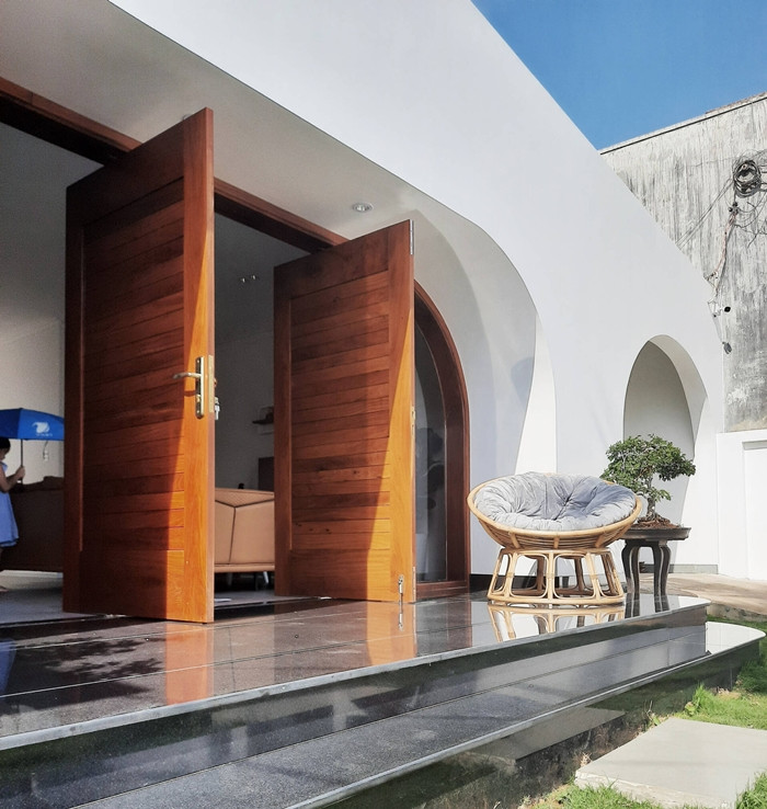 Kết hợp những đường cong là hình khối đơn giản. Ảnh: BL Architects