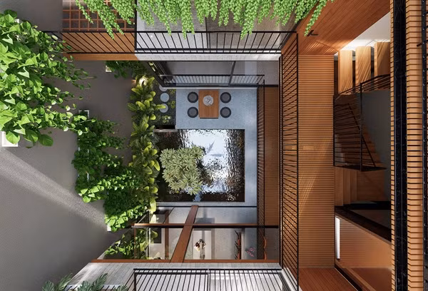 Các mảng thông tầng và tường rỗng đóng vai trò quan trọng trong việc điều hòa không khí, giảm bức xạ nhiệt. Ảnh: Tran Trung Architects