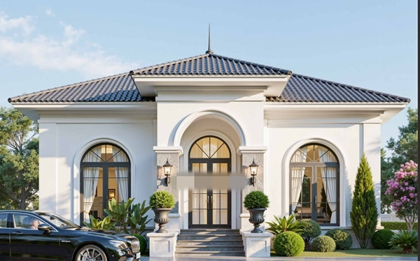 Nhà cấp 4 mái Nhật hướng tới sự tinh tế với màu sắc nhẹ nhàng. Hệ thống cửa kính lớn giúp không gian nhà luôn ngập tràn ánh sáng. Ảnh: Unpac