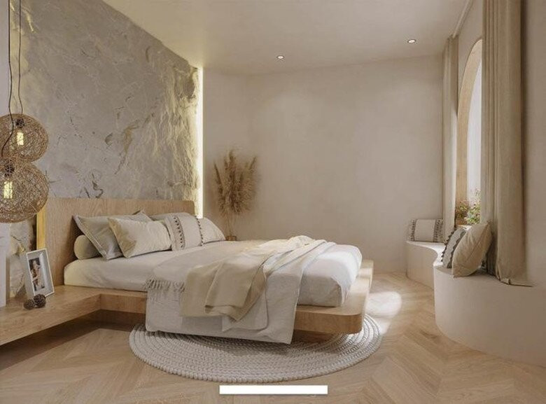 Phòng ngủ tối giản với đèn vàng chìm trong tường. Ảnh: FBNV