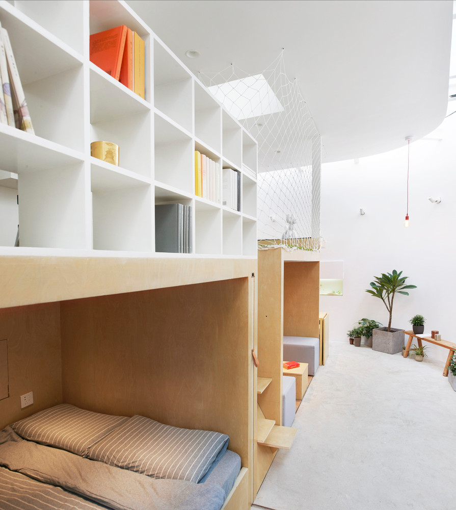 Trong mỗi hộp gỗ là phòng ngủ, phòng khách, phòng làm việc. Ảnh: Ruijing Photo