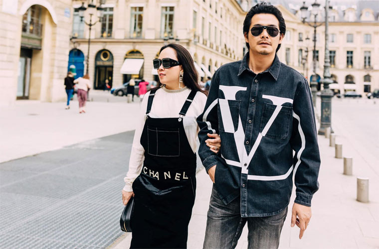 Dù đắp hàng hiệu lên người nhưng trông nam diễn viên quê Cà Mau vẫn bị lép vế khi đi cạnh người tình hơn 9 tuổi.