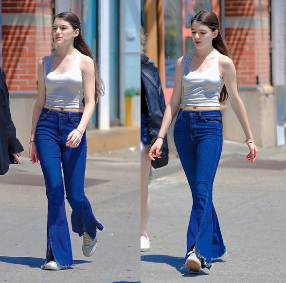 Với chiều cao 1m70 cùng đôi chân dài thẳng tắp giống mẹ và khuôn mặt đẹp như bố, Suri Cruise luôn gây chú ý mỗi khi xuất hiện.