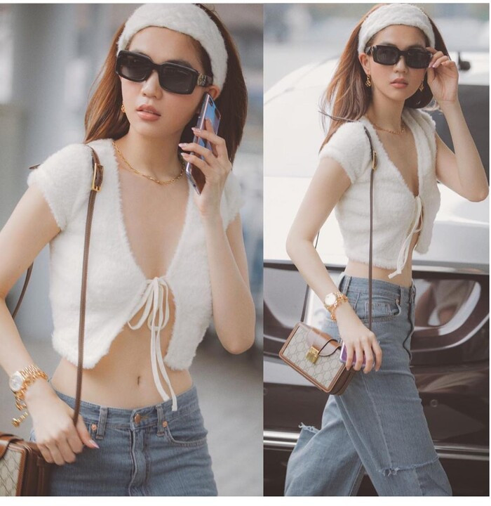 Thiết kế áo buộc dây là phong cách được các mỹ nhân Việt ưa chuộng, Ngọc Trinh cũng không phải ngoại lệ. Diện lên mình kiểu áo crop top mỏng manh với phần dây buộc ở giữa ngực, "nữ hoàng nội y" khiến dân tình "xịt máu mũi" khi khoe trọn vòng eo con kiến cùng vòng 1 hững hờ. Nếu không khéo léo che chắn, người đẹp Trà Vinh rất dễ bị "lộ hàng".