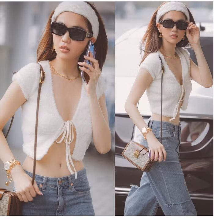 Thiết kế áo buộc dây là phong cách được các mỹ nhân Việt ưa chuộng, Ngọc Trinh cũng không phải ngoại lệ. Diện lên mình kiểu áo crop top mỏng manh với phần dây buộc ở giữa ngực, "nữ hoàng nội y" khiến dân tình "xịt máu mũi" khi khoe trọn vòng eo con kiến cùng vòng 1 hững hờ. Nếu không khéo léo che chắn, người đẹp Trà Vinh rất dễ bị "lộ hàng".