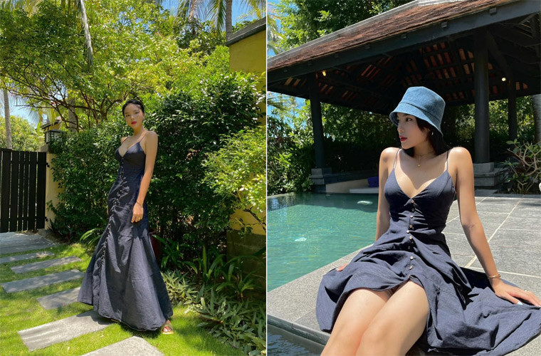 Chiếc váy hai dây tối màu nhưng được may trễ ngực nhất có thể khiến người đẹp Nam Định khoe gần hết vòng 1 nảy nở.