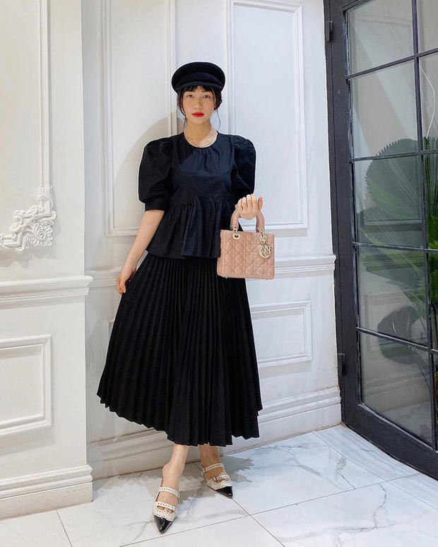 Những trang phục như thế này càng khiến mọi người tin cô muốn che vòng 2 để giấu việc sinh con cho đại gia. (Ảnh: FBNV)