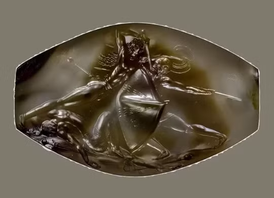 10. Bức tranh siêu nhỏ 3.500 tuổi phải xem bằng... kính hiển vi. Người ta vẫn không thể hiểu làm sao mà người xưa có thể khắc được bức tranh tinh xảo đến mức phải dùng kính hiển vi hiện đại mới xem rõ hết các chi tiết được. Viên ngọc mang bức tranh nói trên được tìm thấy ở Hy Lạp.