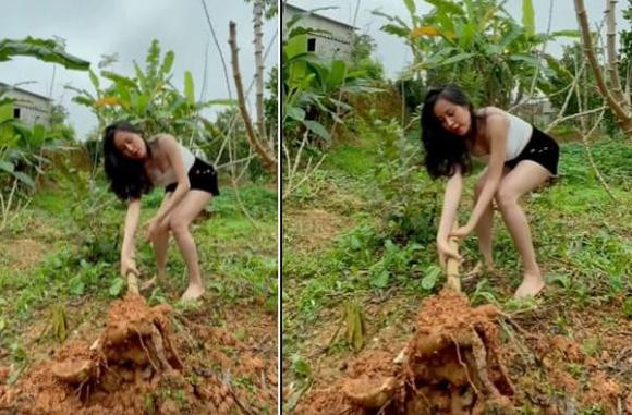 Khi quay clip Bà Tưng cố vén tóc, xoay người để khoe vòng 1.