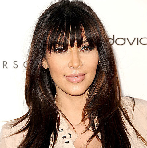 Tháng 4/2013, đang mang thai đứa con đầu long với West nên trông mặt Kim bị sưng to hơn bình thường.