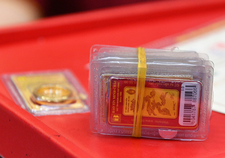 Gia vang hom nay 26/12: Tang choang vang, vang SJC len sat 80 trieu dong-Hinh-3