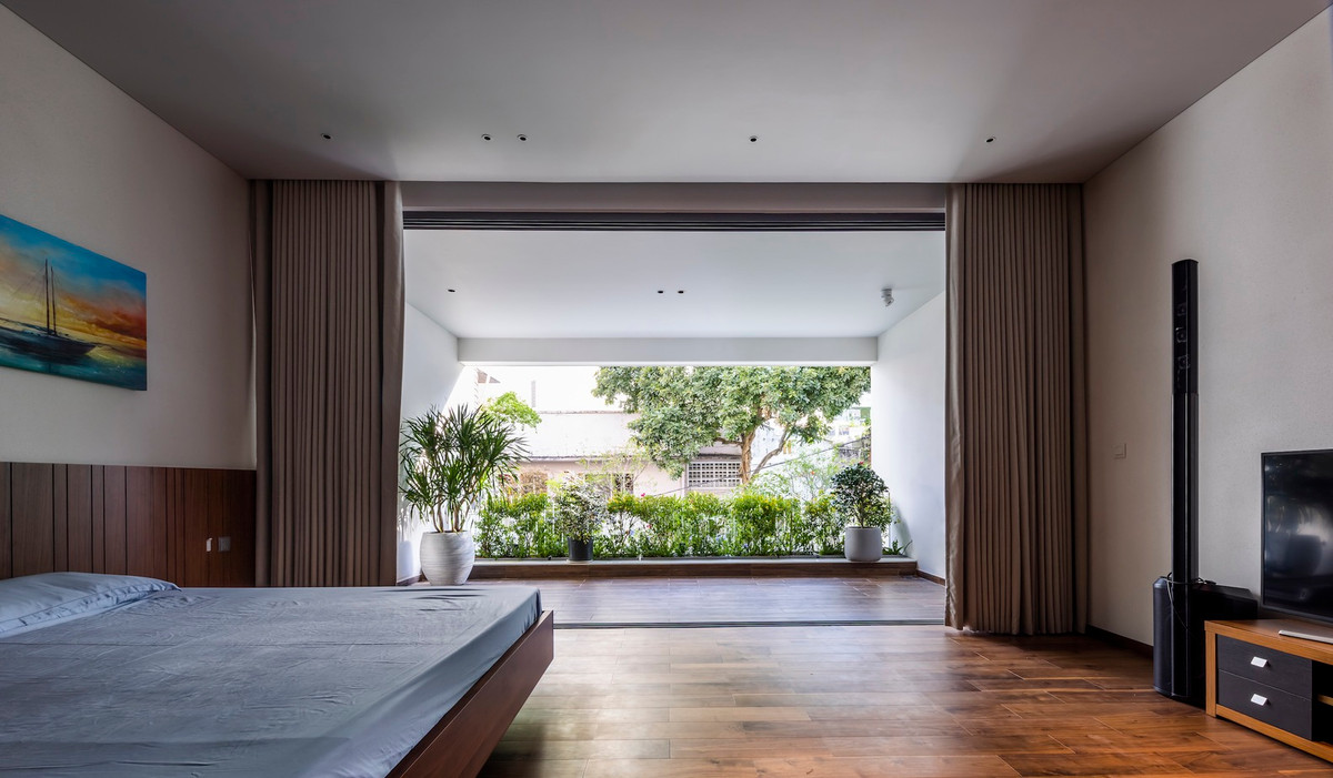 Không gian phòng ngủ mang đến cảm giác như ở giữa rừng cây.