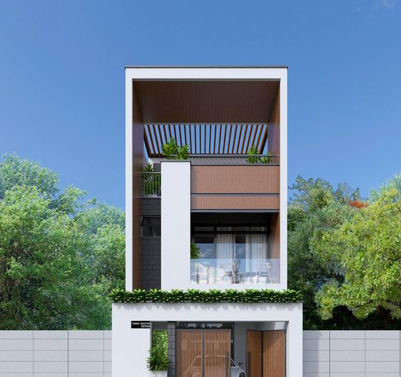 Nhà ống 2 tầng đẹp mắt với thiết kế hệ lam tại khu vực sân thượng. Ảnh: Songphat construction