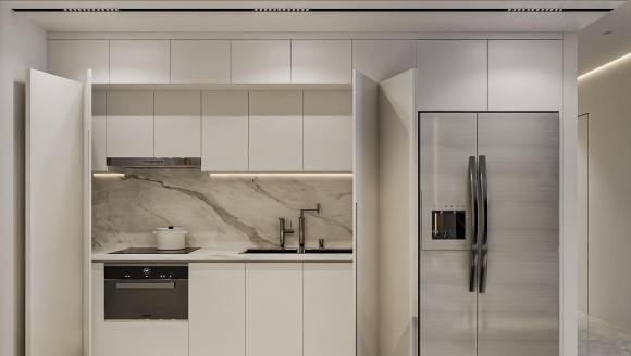 Điểm nổi bật trong phòng bếp là tủ bếp ẩn có thể mở ra - đóng vào vô cùng tiện lợi và gọn gàng.