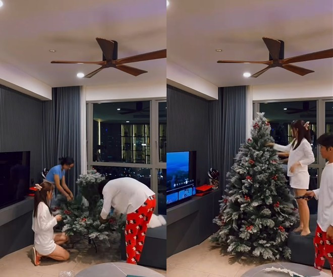 Nội thất chủ yếu mang gam màu xám từ sofa, rèm cửa đến bức tường phía kệ tivi...