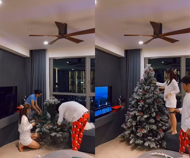 Nội thất chủ yếu mang gam màu xám từ sofa, rèm cửa đến bức tường phía kệ tivi...