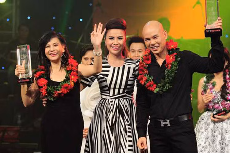 Năm 2013, nữ nghệ sĩ cùng ca sĩ Phan Đinh Tùng giành giải bạc chương trình Cặp đôi hoàn hảo. Ảnh: VTC