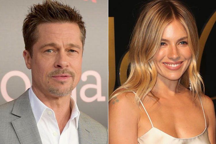 Brad Pitt còn vướng tin đồn tình cảm với ngôi sao nước Anh Sienna Miller khi cả hai bị bắt gặp thân mật tại một lễ hội âm nhạc. Ảnh: Extra