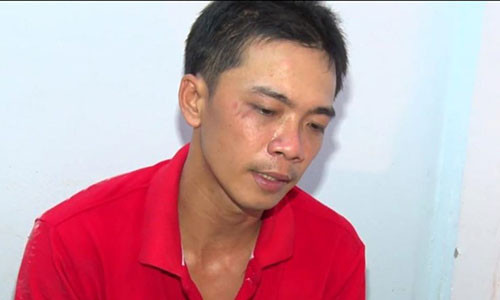 Trần Tấn Lợi tại cơ quan công an.