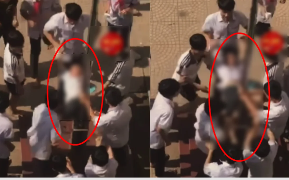 Ha Noi: Nam sinh bi cac ban dap vung kin vao cot gay phan no