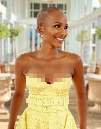 Cô có hình thể quyến rũ, làn da nâu khỏe khoắn và học vấn cao.