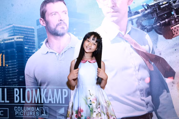 Diễn viên nhí Thanh Mỹ cũng hào hứng đi xem chú robot Chappie - bộ phim hành động với sự góp mặt của “người sói” Hugh Jackman.