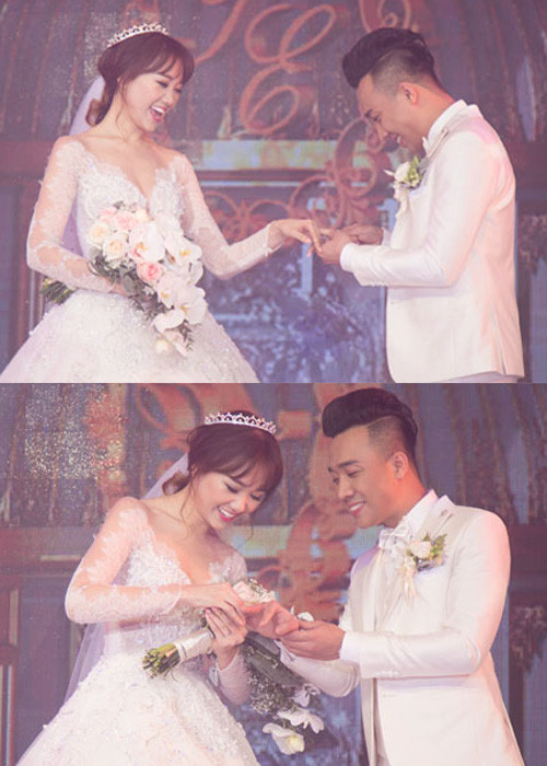 Đôi uyên ương trao nhẫn cưới. Trên sân khấu, chú rể đã hứa nuôi cô dâu suốt đời. ( Ảnh: Dân Việt)