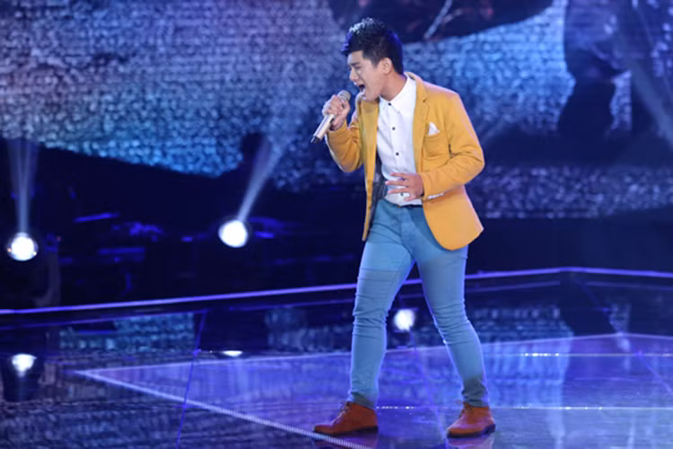 Sau những tranh cãi, Đoàn Thế Lân dừng chân ở top 9 cuộc thi The Voice Kids 2014. (Ảnh: VTC News)
