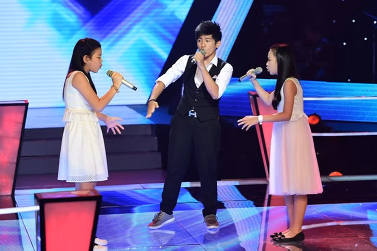 Ở The Voice Kids 2014, Đoàn Thế Lân là một trong những thành viên của team ca sĩ Lam Trường. (Ảnh: Zing News)