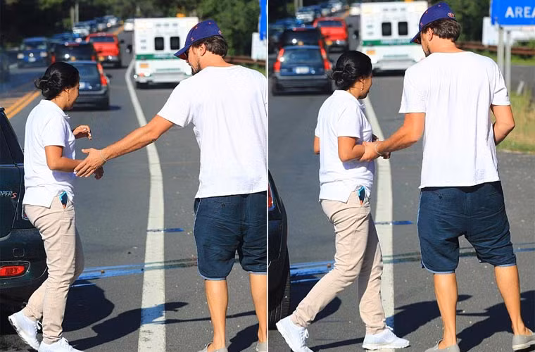 Không chỉ vỗ về người yêu, ngôi sao Titanic còn tỏ ra rất lịch sự khi anh mở cửa xe, dìu và an ủi người lái xe không may gây tai nạn.