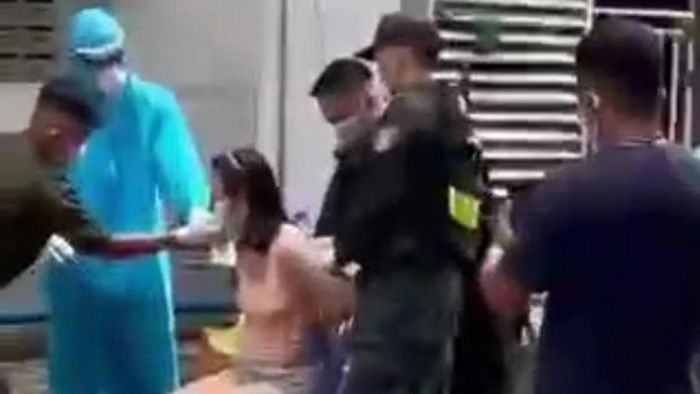 Binh Duong pha cua, khong che mot phu nu di test COVID-19-Hinh-2