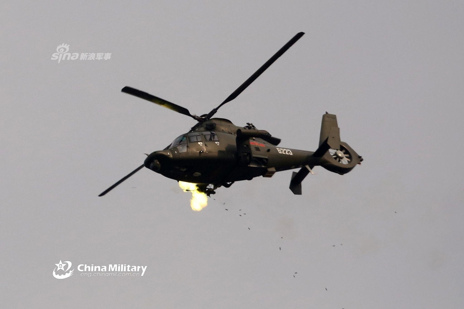 Vũ khí chính của loại trực thăng này là 2 khẩu pháo 23mm Type 23-2. Nguồn ảnh: Sina.