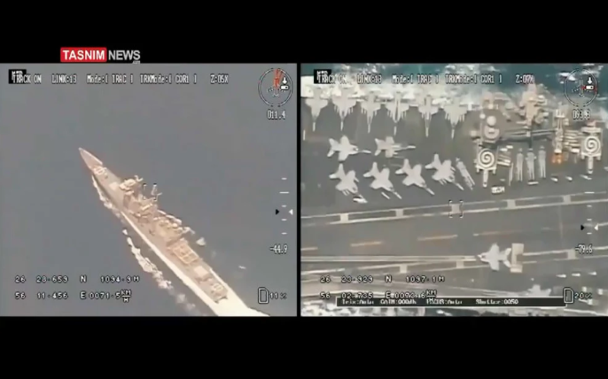 Cận cảnh hình ảnh khu trục hạm của Mỹ hộ tống tàu sân bay và các chiến đấu cơ trên hàng không mẫu hạm Mỹ hoạt động ở vùng Vịnh Ba Tư được các máy bay không người lái của Iran ghi lại. Nguồn ảnh: TASNIM.