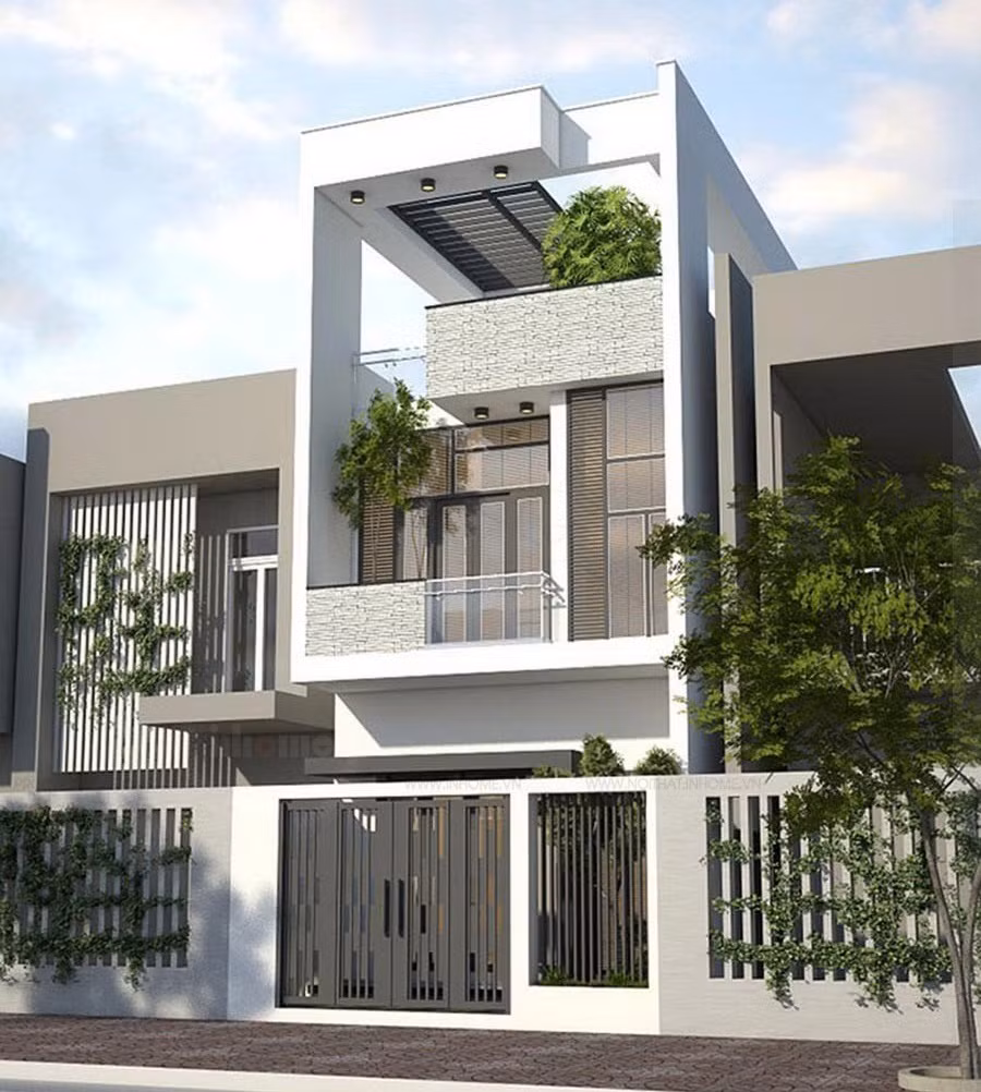  Nhà ống 2 tầng đơn giản, kết hợp hài hòa giữa màu trắng và xám. Ảnh: Inhome.