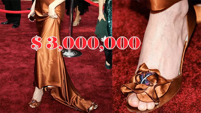 Giày cao gót Rita Hayworth của hãng Stuart Weitzman trị giá 3 triệu USD (khoảng 70 tỷ đồng) có phần hoa gắn trên mũi giày được chế tác tinh xảo, từ nhiều viên kim cương, ngọc bích, hồng ngọc, ruby. Ảnh: Therichesst.