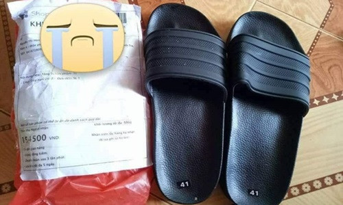 Sản phẩm nhận được là đôi dép "lệch". Ảnh: FB Lê Xuân Phương.